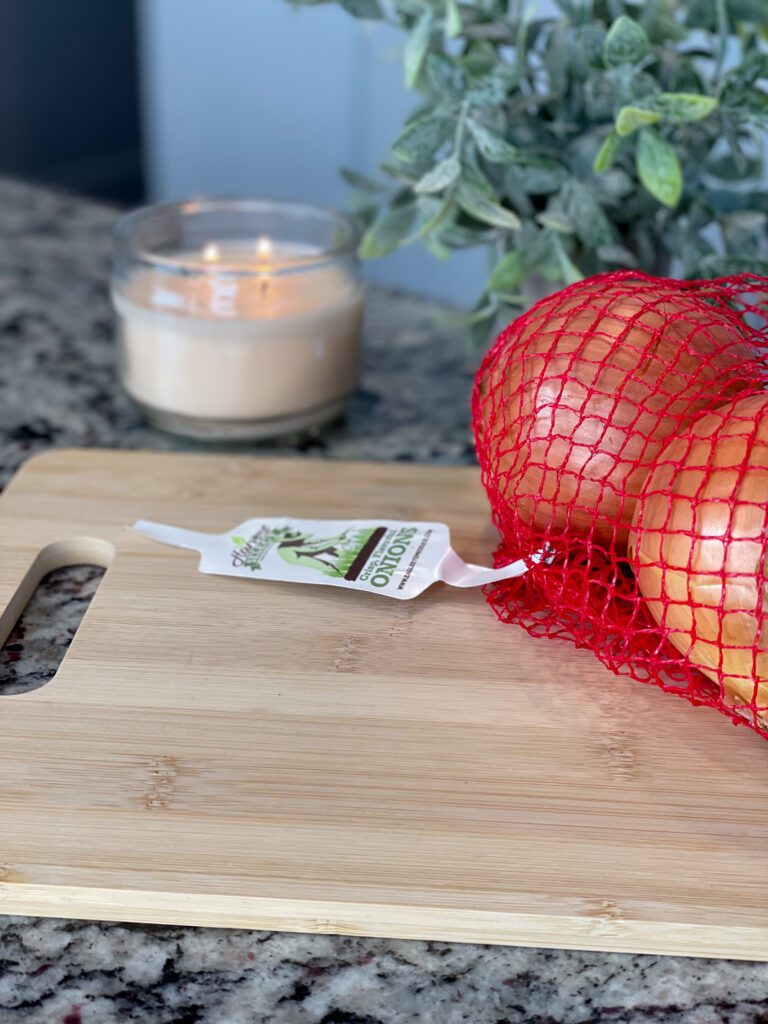 Harvest Select Onions on wooden cutting board